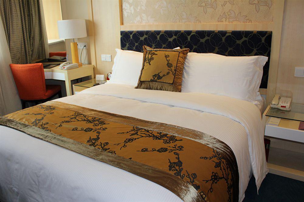 Puxi New Century Hotel Шанхай Номер фото